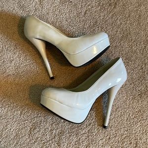 White Charlotte Russe pumps. Size 6
